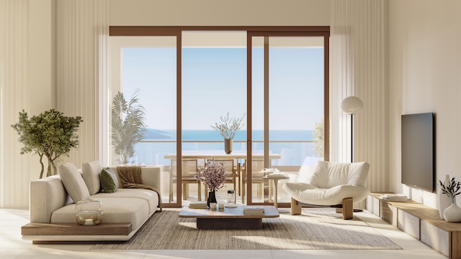 Große Fensterfronten, natürliche Materialien und offene Wohnbereiche prägen die Residenzen von The Peaks. Viele Apartments bieten einen freien Blick auf die Adria und großzügige Terrassen.
